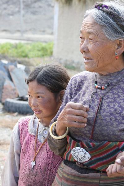 143 Grandma and granddaughter near Ngor Monastery.jpg